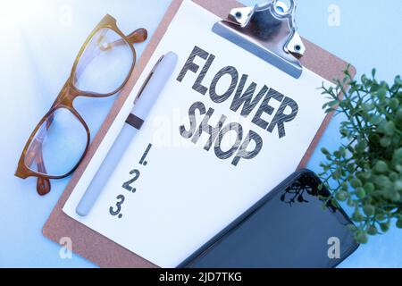 Writing displaying text Flower Shop. Business concept where cut flowers are sold with decorations for gifts Flashy School Office Supplies, Teaching Stock Photo