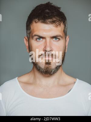 Portrait of serious man. Man portrait. Bearded guy. Human expression emotion concept. Stock Photo