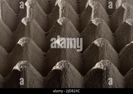 Abstract background. frame geometry. Egg packaging. Paper tray for domestic eggs. Beige and grey. Minimalism. Paper packaging egg carton Stock Photo