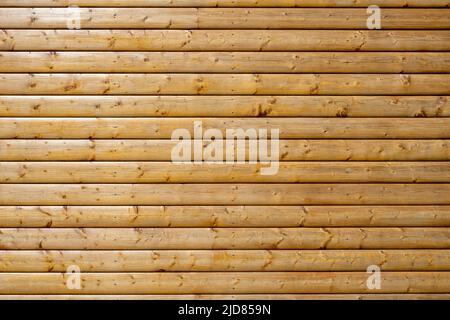 Background from a wall made of painted brown wooden planks Stock Photo