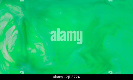 Fluid art green background. Abstract liquid backdrop. Green turquoise stains on liquid surface Stock Photo