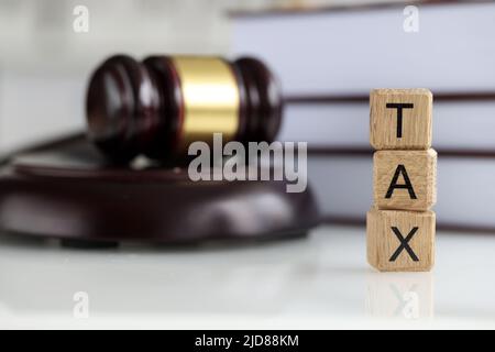 Tax word collected of wooden blocks letters, tax-filling Stock Photo