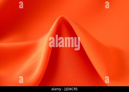 Bright orange fabric background, cotton cloth texture Stock Photo