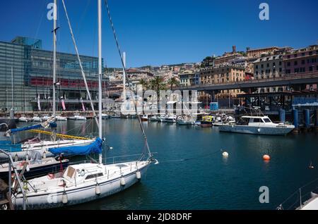 Genoa, Italy - June, 2022: Marina for yachts and boats in port of Genova. Building of maritime museum called Galata Museo del Mare in backgroun Stock Photo