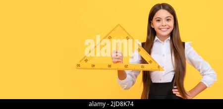 angle degree measurement. trigonometry stationery. measuring and sizing. Horizontal isolated poster of school girl student. Banner header portrait of Stock Photo