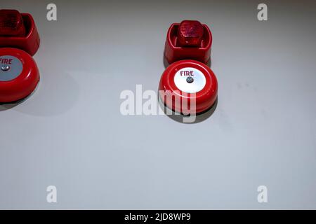Fire alarm switch on the factory wall Stock Photo