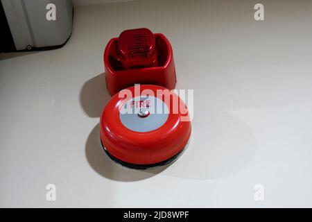 Fire alarm switch on the factory wall Stock Photo