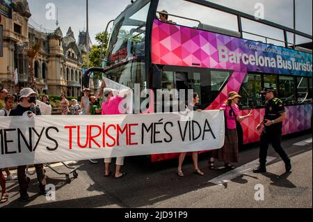 Barcelona, Spain. 19th June, 2022. Barcelona residents block a tourist bus on route during a protest against mass tourism in the city. Credit:  Jordi Boixareu/Alamy Live News Stock Photo