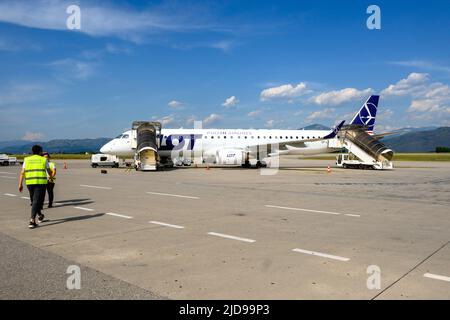 Podgorica, Montenegro - June 3, 2022: The airplane of the Polish LOT airlines Stock Photo