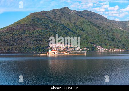 Church at magnificent small island in Kotor Bay Montenegro . Latarnia Morska Our Lady of the Rocks Stock Photo