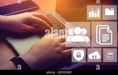 Banner of online documentation database and document management system concept. Laptop with virtual screen. Process automation. Stock Photo