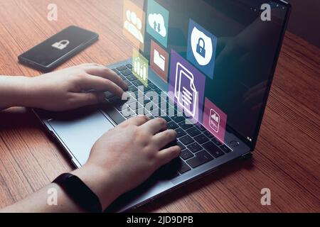 Businesswoman using a computer to document management System concept. Digital administration interface. Corporate business technology. Stock Photo