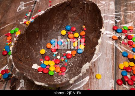 LARGE EASTER EGG WITH COLORED CANDIES. Stock Photo