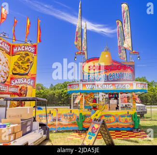 Food vendors at a carnival Stock Photo