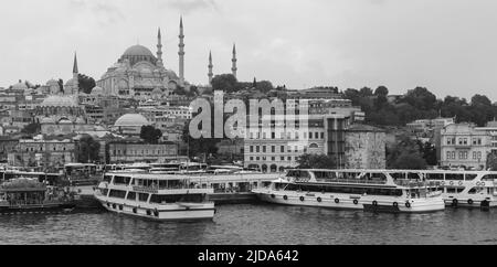 Istanbul panoramic black and white photo. Golden Horn coastal view, Suleymaniye Mosque is on a background Stock Photo