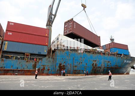 CHITTAGONG, BANGLADESH - Aerial view of containers and shipyard cranes and trucks are at Chittagong Port. Chittagong Port on the banks of the Karnaphu Stock Photo