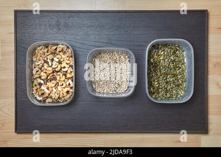 Nuts and seed in boxes Stock Photo
