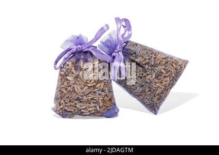 Lavender bag or pouch with dried lavender flowers isolated on white. Two aromatic sachet with dry lavender Stock Photo