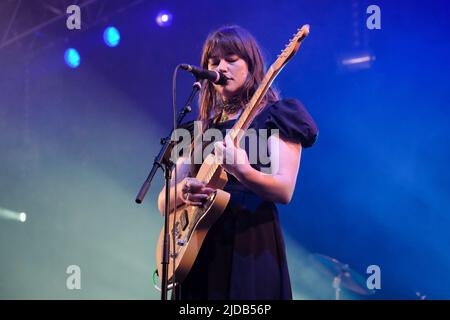 Newport, UK. 19th June, 2022. Rhian Teasdale, lead vocalist and rhythm guitarist with British indie rock band Wet Leg from the Isle of Wight UK performing live on stage at the Isle of Wight Festival. (Photo by Dawn Fletcher-Park/SOPA Images/Sipa USA) Credit: Sipa USA/Alamy Live News Stock Photo