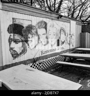 Street art depicting faces of numerous celebrities of the past; Winnipeg, Manitoba, Canada Stock Photo