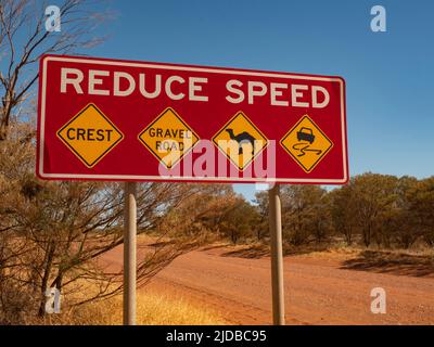 Road warning sign on Mereenie Loop Road, Northern Territory. Stock Photo