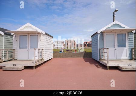 Beach huts and kiddies train in St Annes,Lancashire Stock Photo