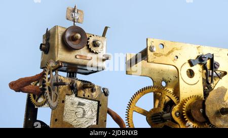 The robot repairs the mechanism. Under construction concept. Stock Photo