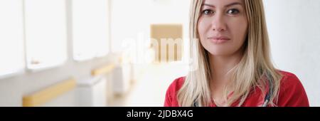 Beautiful woman doctor in the hospital corridor Stock Photo