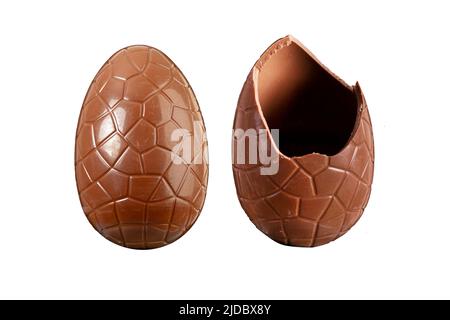 Chocolate Easter egg whole and broken isolated on a white background Stock Photo