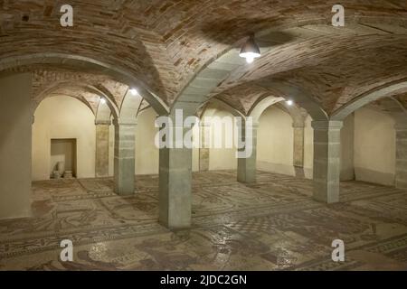 Bobbio, Italy - May 24, 2018:  The  floor mosaics of the eleventh century in the crypt of the Abbey of San Colombano Stock Photo