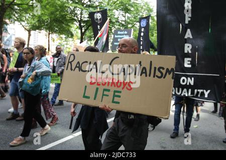 Activists from environmental organisations and supporters attend the Climate March on June 19, 2022 in Rotterdam,Netherlands. Protestors demand action Stock Photo