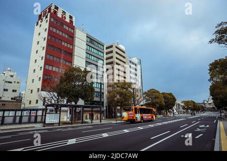 Himeji, Japan - January 08, 2020: Panoramic View to the Main Himeji Street with the Trees and Buildings Stock Photo