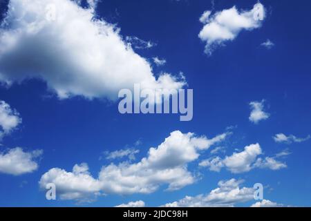 Blue sky with small cumulus clouds Stock Photo