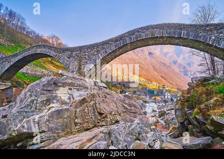 Ponte dei Salti is one of the most well known landmarks of Valle Verzasca, located on Verzasca River, in Lavertezzo, Switzerland Stock Photo