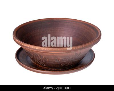 Empty plate of brown clay isolated on white background Stock Photo