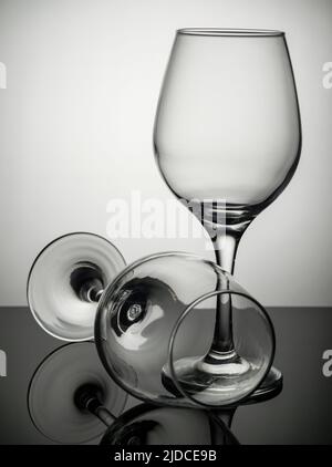 Wine glasses on grey background. Direct sunlight, aesthetic still life  Stock Photo - Alamy