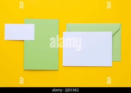Set of branding elements on yellow background. Mock up for graphic designers presentations or business portfolios. Stock Photo