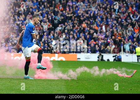 File photo dated 05-05-2022 of Rangers' Borna Barisic kicking a flare off the field. The Ibrox club have been fined 6,000 Euros (£5,150) for the 'throwing of objects' from the stand, while they have incurred an additional penalty for 'lighting of fireworks' during the match on May 5, which the Scots won 3-1. Issue date: Monday June 20, 2022. Stock Photo