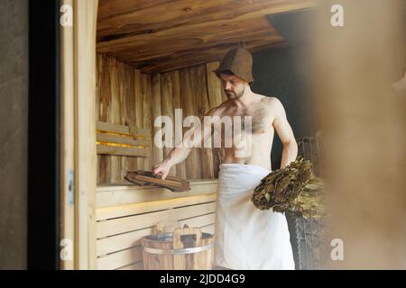 Handsome man in the sauna Stock Photo