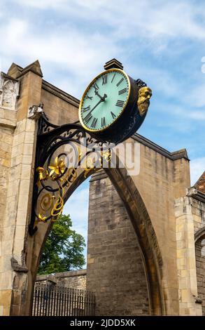 Ornate clock on St Martin le Grand church on Coney Street in York city centre, York, North Yorkshire, England. Little Admiral statue is gone missing. Stock Photo