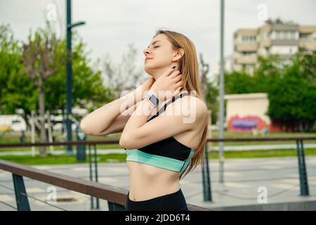Young Caucasian Woman Wearing Black Sports Bra Standing On City