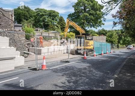 Completed blockwork now in  place at Kayley Hill, Long Preston where major work is taking place to repair a large wall ........20th June 2022. Stock Photo