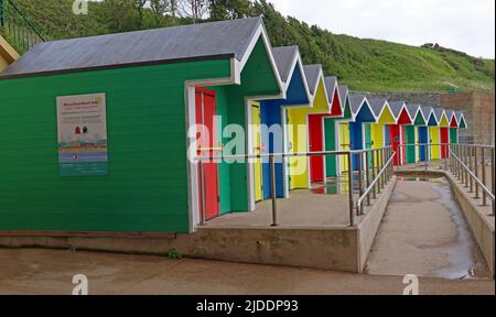 Multicoloured Barry Island beach huts for hire / rent , Barry, looking over Whitmore Bay, Vale Of Glamorgan, Wales, Cymru, UK, CF62 5DA Stock Photo