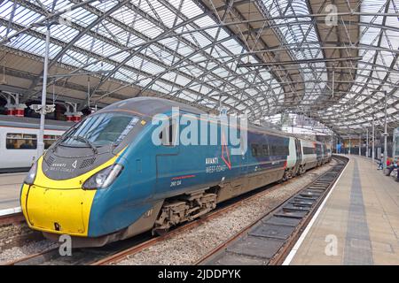 Avanti West Coast Train Operating Company Pendolino train at Liverpool Lime Street main line station, Merseyside, England, UK Stock Photo