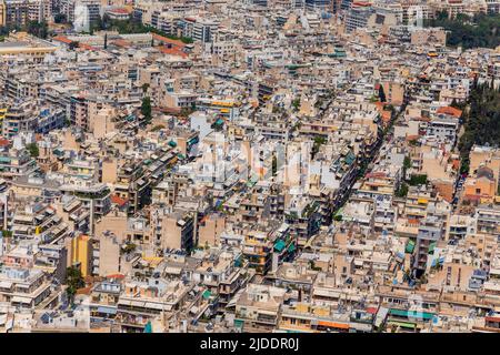 ATHENS, GREECE - MAY 06 2022: Dense living and architecture in Athens, Greece. Residential district with a lot of houses and real estate in the South Stock Photo