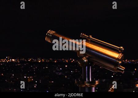 A monocular looking out over the city of Paris Stock Photo