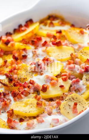 baked potatoes with bacon and eggs Stock Photo