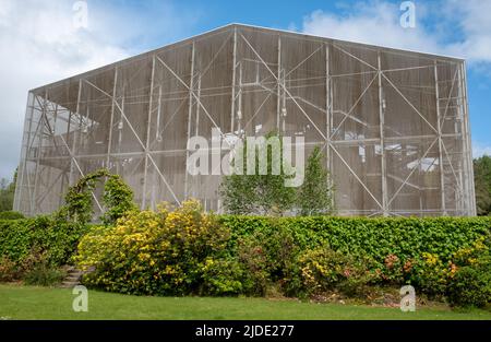 Hill House in protective steel mesh box. House designed in British Art Nouveau Modern Style by Charles Rennie Mackintosh and Margaret Macdonald. Stock Photo