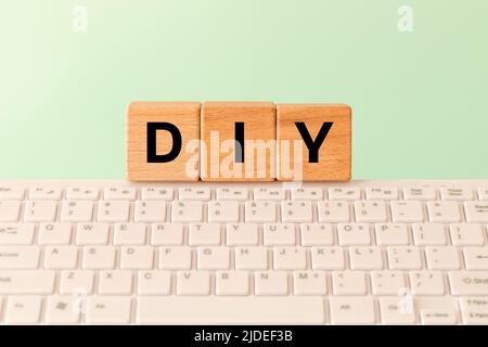 DIY - Do It Yourself acronym on white background Stock Photo - Alamy