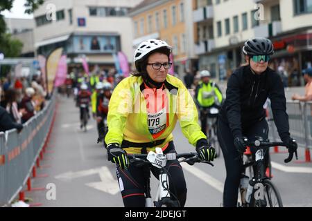 Cyclists during the world’s largest recreational bike ride, Vätternrundan, Sweden, on Friday. Vätternrundan is one of the world's largest exercise races by bicycle and this year 16,000 cyclists have registered to cycle the 315 km long race around lake Vättern. In the picture: Kristina Königsson from Lenhovda, in the start in Motala. Stock Photo